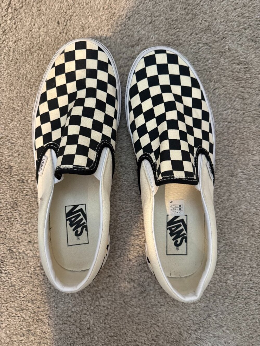 Vans checkered slip ons